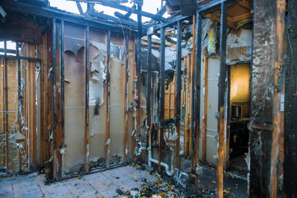 Professional Fire Damage Restoration technician working in Essexville, MI